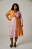 OLIVIA DRESS 0-26 Long sleeve mesh v-neck midi dress with twist front detail In Orange And Pink