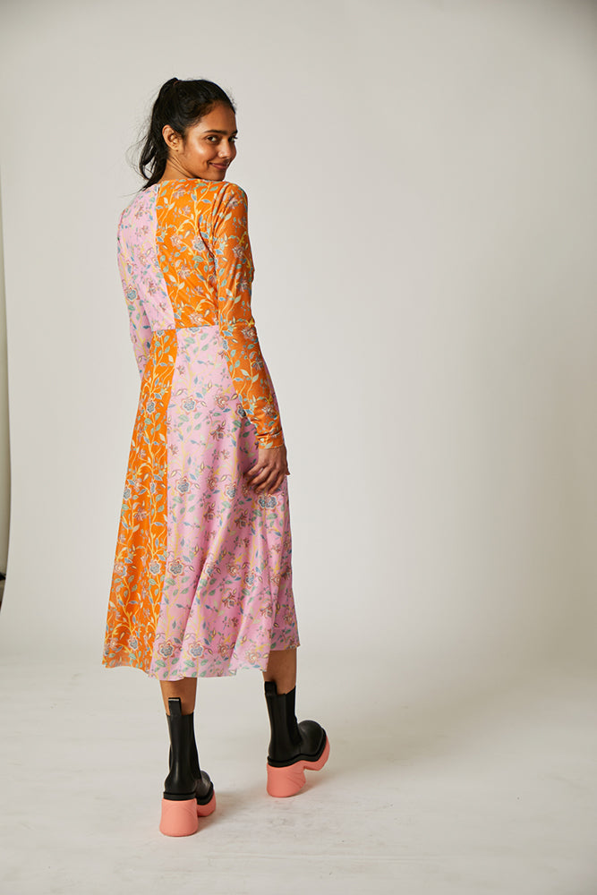 OLIVIA DRESS 0-26 Dress available in inclusive sizing with flower print on orange and pink color block with twist tie front hits at mid knee by Rachel Antonoff